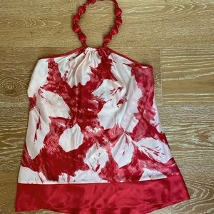 Bebe satin backless shirt with fun satin ball ties.  Women’s size Small.